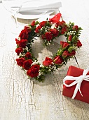 Heart-shape wreath of roses and baby's breath