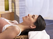 Woman lying on a massage couch