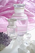 Quartz crystals, amethyst & apothecary bottles (close-up)
