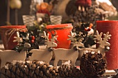Christmas decorations: windlights, reindeer and cones