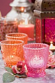 Middle Eastern decorations: windlights, roses, lantern, candles