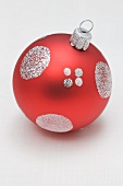 Red Christmas bauble with silver decoration