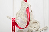 Christmas decoration: skates with red ribbon