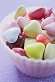 Coloured hearts in small pink dish
