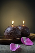 Spherical candles and flower petals