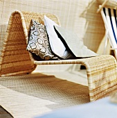 Wicker chair with cushions