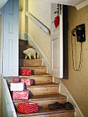 Christmas gifts on wooden staircase