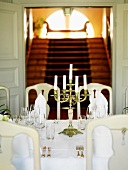 Dining room and staircase in mansion