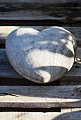 Wooden heart on wooden boards