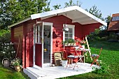 Red, wooden, Scandinavian-style summer house