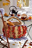 Wicker basket decorated with rosehips
