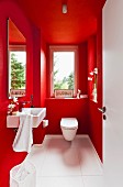 Guest toilet painted vivid red