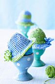 Egg cups with crocheted hats