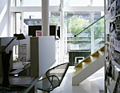 Architect's work corner with models on the table in a contemporary home