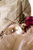 Christmas tree baubles and ostrich feathers