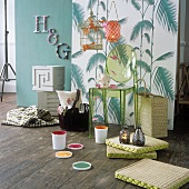 A colourful smorgasbord of paint cans, small furniture and accessories