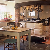 A rustic kitchen with a wood-fired oven