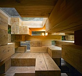 A Japanese house with step-like construction made of wooden beams