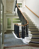 Stair carpet on stone stairs in classic, modern stairwell