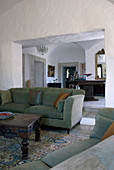 Sofa and antique coffee table on Berber rug