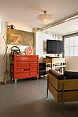 Loft living room with industrial tool cabinet and vintage decor