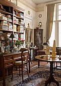 Classic-style study with wooden desk and bookshelf