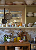 Kitchenette with crockery and kitchen utensils