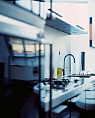 Designer workbench-style, stainless steel kitchen counter