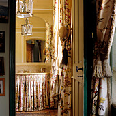 Floral curtains and fabric panelling