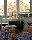 Table with orange juice and fresh fruit