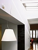 Kitchen area with blackboard, pendant lamp & hallway with skylight