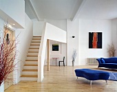 Living space with seating & staircase