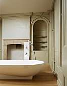 Bathroom with free-standing bathtub in renovated old building