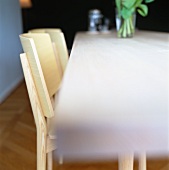 Chairs at dining table