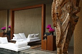 Spa swing bed with cushions in modern Indian atmosphere