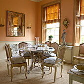 Dining area with antique round table and chairs