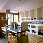 Kitchen with open shelves and wooden floor