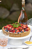 Berry tart with fresh raspberries, blueberries and strawberries