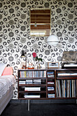 Patterned wallpaper, CDs and record collection