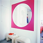 Large round mirror on partition