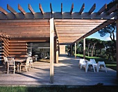 Large wooden terrace with sunshade