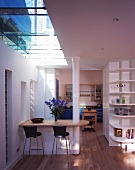 Skylight above counter with bar stools