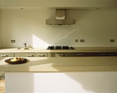 A kitchen with an island counter