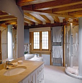 Modern bathroom in rustic, half-timbered house