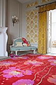 Bright, floral rug in front of Rococo bench