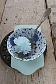 Rice bowl with paper flower and spoon