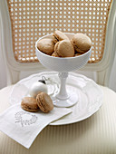 Macaroons in white china dish with Christmas bauble