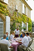 Bed and breakfast in Mediterranean country house - guests taking breakfast on the terrace
