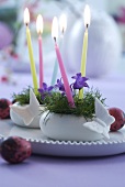 Small Easter arrangements of harebells and candles