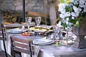 A table set for a celebration on a terrace